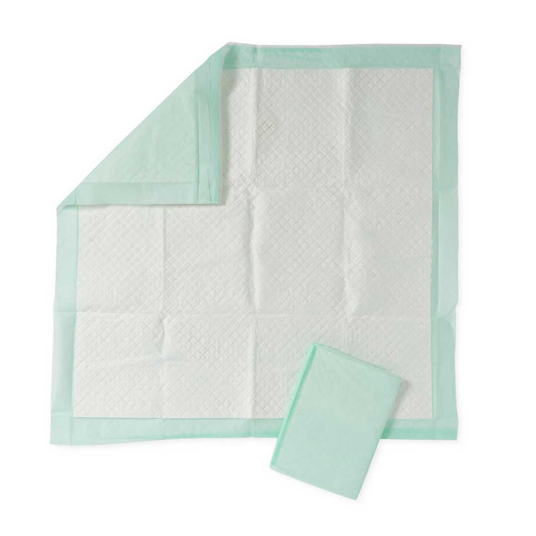 The Medline Protection Plus Disposable Underpads feature a rectangular shape with a green border and white center for absorbency and odor control; shown partially unfolded with another folded pad placed on top.